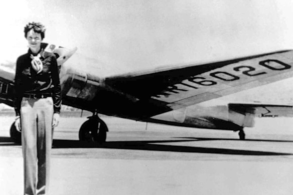 Amelia Earhart stands next to a Lockheed Electra 10E, not long before her last flight. 