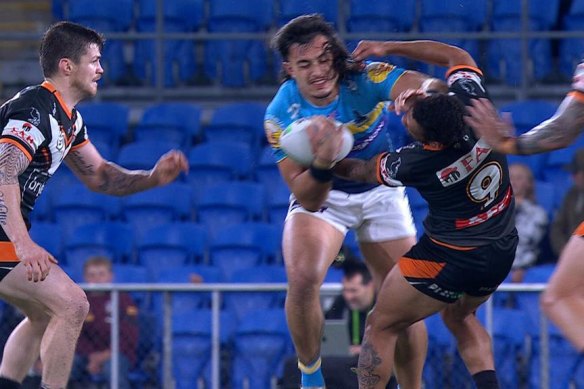 Turn away, Freddy: Brad Fittler would have hated the sight of Api Koroisau suffering a suspected broken jaw in this tackle.