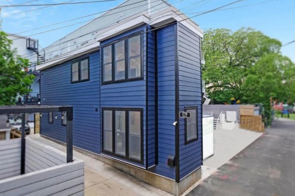 The skinny home is set on a former driveway.