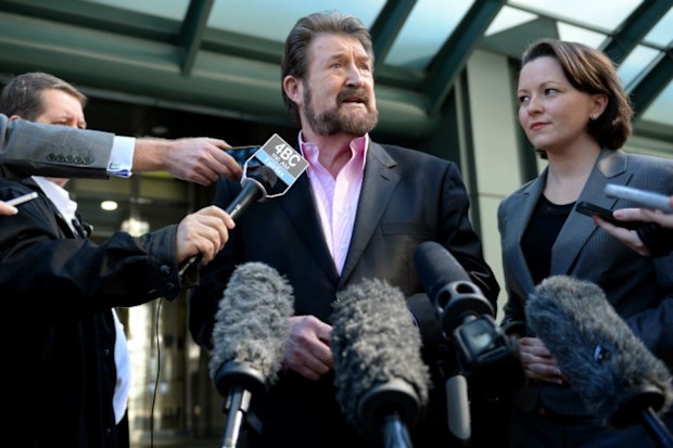 roadcaster Derryn Hinch speaks to the media outside the State Law building in Brisbane after meeting with Queensland's attorney-general Jarrod Bleijie. (AAP Image/Dan Peled)