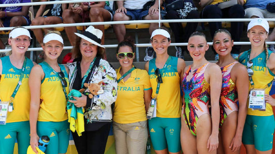 Gina Rinehart with members of Australia’s artistic swimming team.