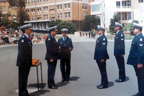 Wayne Sherwell (third from right) receives his Valour Award at the Police Academy.