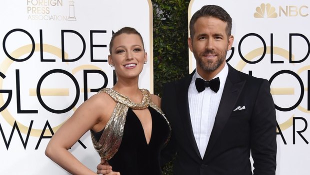 Blake Lively and Ryan Reynolds arrive at the Golden Globe Awards.