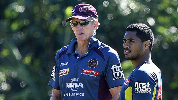 Protective: Wayne Bennett and Anthony Milford.