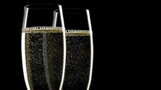 Two glass of champagne on black background ChampagneÂ 
iStock