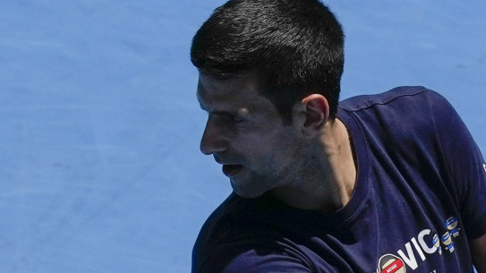 Defending men’s champion Serbia’s Novak Djokovic practices on Rod Laver Arena ahead of the Australian Open tennis championship in Melbourne, Australia, Wednesday, Jan. 12, 2022. AP Photo/Mark Baker)