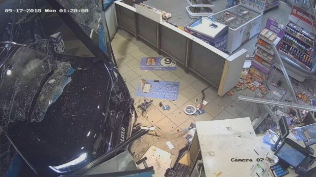 The shop after Lee Kam Shau drove his car through the front.