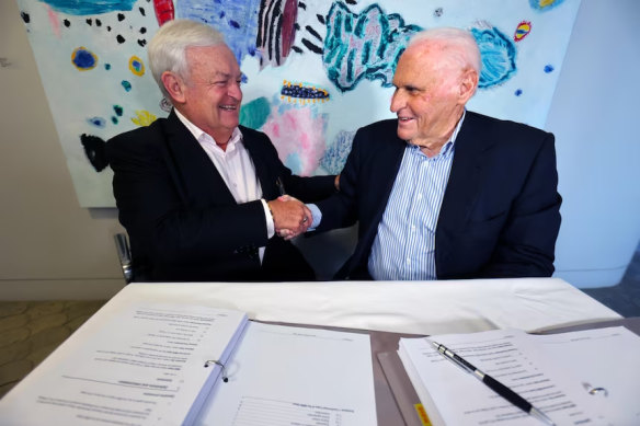 Blacktown Mayor Tony Bleasdale and Lang Walker, of Walker Corporation, at the signing of the land sale deal.