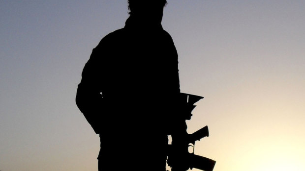 A generic photo of ADF soldier (main) and Melbourne-based academic Samantha Crompvoets (inset).