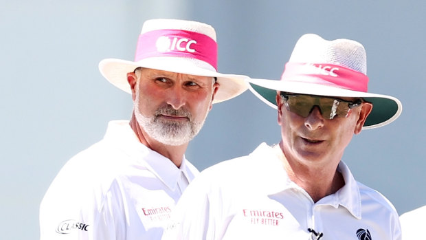 Former Test umpire Paul Wilson, left, with Paul Reiffel.
