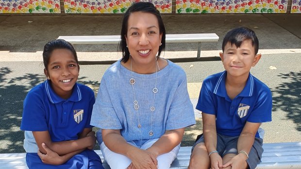 Cindy Valdez-Adams, pictured here with students from Fairfield Public School, says teaching English as an additional language is “the most rewarding” role. 