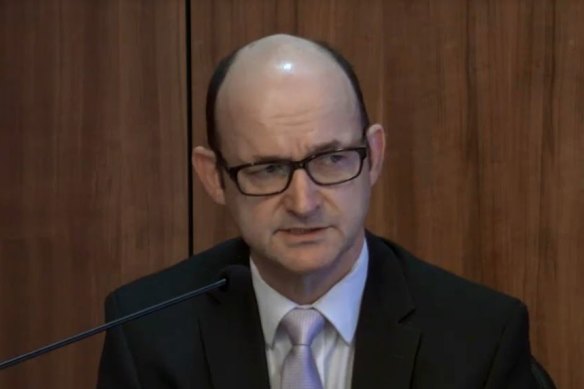 Victoria Police's head of legal services, Findlay McRae, gives evidence at the royal commission