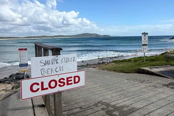 A beach closure sign following the incident at Point Plomer.