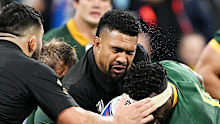Siya Kolisi of South Africa commits a high tackle with head contact on Ardie Savea of New Zealand.