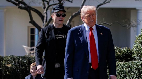 Trump, Elon Musk and son X Æ A-Xii at the White House last month.