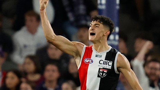 First-gamer Anthony Caminiti celebrates as St Kilda storm to a win over Fremantle at Marvel Stadium.