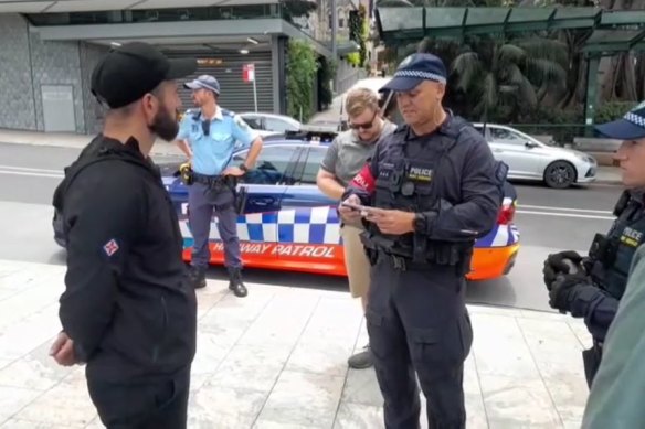 Thomas Sewell is served with an order prohibiting him from entering the City of Sydney outside North Sydney station.