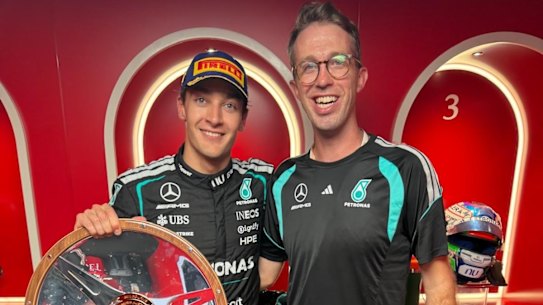 Australian Kim Keedle with 2026 Melbourne Grand Prix winner George Russell of Mercedes.