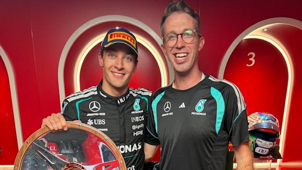 Australian Kim Keedle with 2026 Melbourne Grand Prix winner George Russell of Mercedes.