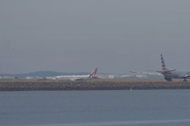 The two planes reportedly stopped about one kilometre from each other.