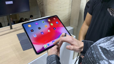 The iPads are big, but light enough to use one handed.
