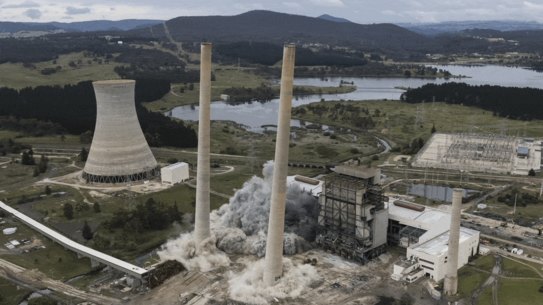 A controlled blast demolishes part of the old Wallerawang Power Station.