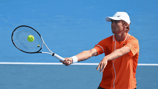 Hayden Jones, in orange, and his sister Emerson Jones, in green, are among the best Australian junior tennis players.