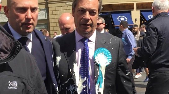 Britain's Nigel Farage after being hit with a milkshake during a campaign walkabout in Newcastle, England.