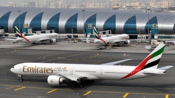 An Emirates plane taxis to a gate at Dubai International Airport at Dubai International Airport in Dubai, United Arab Emirates. 