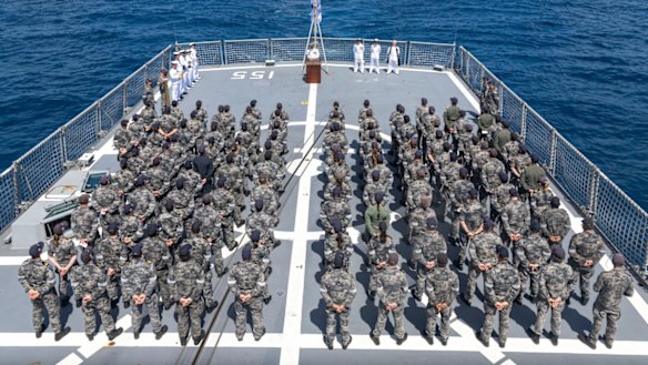 HMAS Ballarat Ship’s Company on the flight deck.