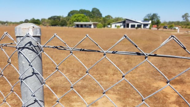 Police are raiding a rural property in McMinns Lagoon, connected to last month's shootings in Darwin. Detectives paying particular attention to granny flat and rear shed. 