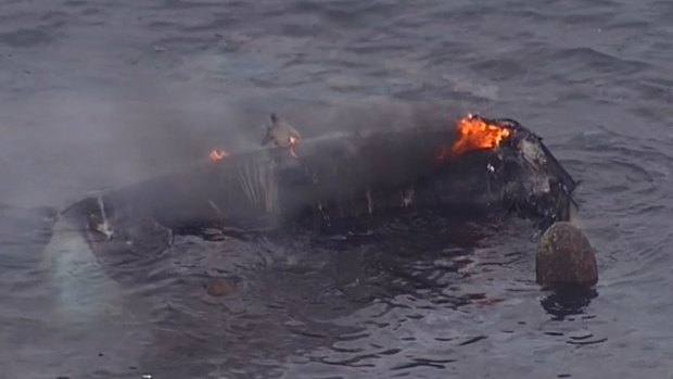 Eight people needed rescue after a whale watch vessel caught fire off Main Beach at the Gold Coast.