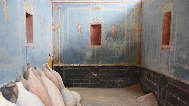 The new room excavated in Pompeii and announced in June 2024. The room is painted blue and has been interpreted as a sacrarium, a shrine devoted to ritual activities and the storage of sacred objects.