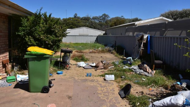 Junk and debris was left littering the yard when tenants vacated the property.