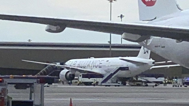 The Singapore Airlines Boeing 777-300ER on the tarmac at Bangkok’s Suvarnabhumi Airport after an emergency landing following severe turbulence over Myanmar.