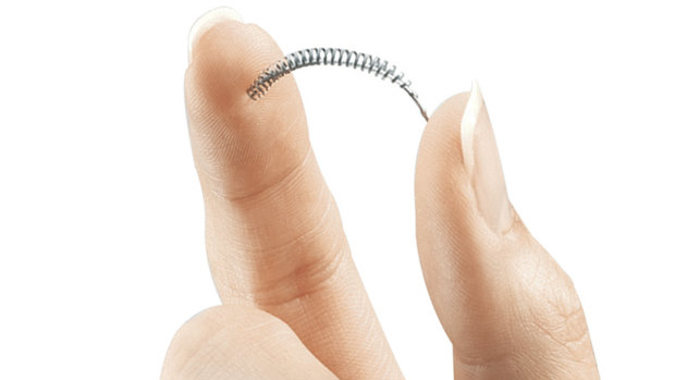 The metal coil that expands to anchor the Essure device in women's fallopian tubes. 