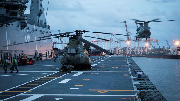 Australian Army CH-47 Chinook helicopters pictured at the HMAS Adelaide before it departs the port of Brisbane.