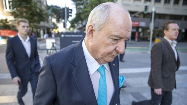 Alan Jones arriving at the Brisbane Supreme Court to give evidence during the trial.