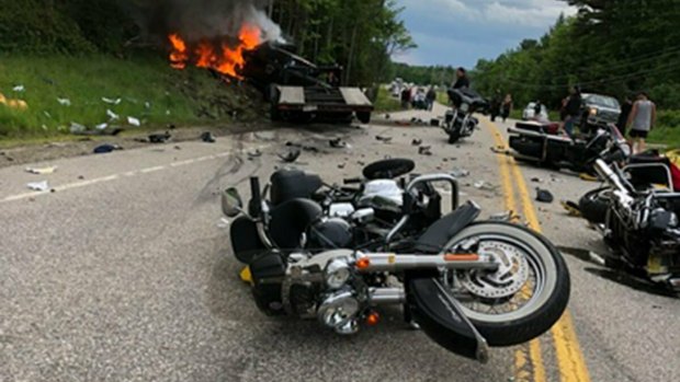 The scene where several motorcycles and a pickup truck collided on a rural, two-lane highway in New Hampshire.