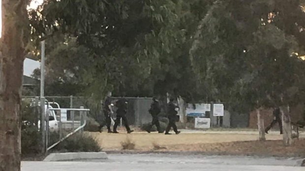 Special Operations Group officers at the scene in Pakenham