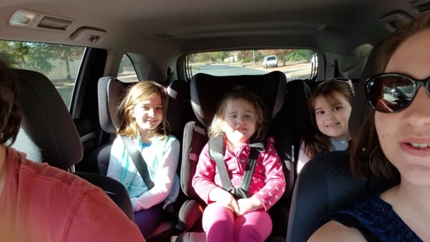 Banks family Lachlan Wilson (obscured) and Cassandra Weller and their daughters, Paityn, Millicent and Annabelle,  on their way to Sydney, before the crash