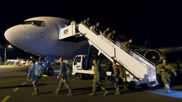 US troops disembarking their flight from Hawaii at Rockhampton Airport.