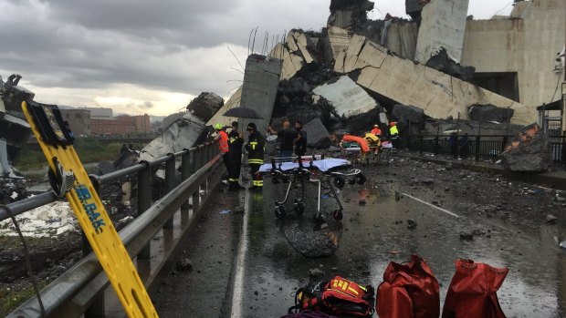 Cars are blocked on the Morandi highway bridge after a section of it collapsed.