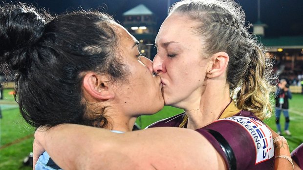 Karina Brown and Vanessa Foliaki kiss at the end of the inaugural women's State of Origin match in 2018.
