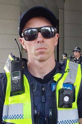 Victoria Police is investigating this officer who wore an 'EAD Hippy' sticker during the protests.