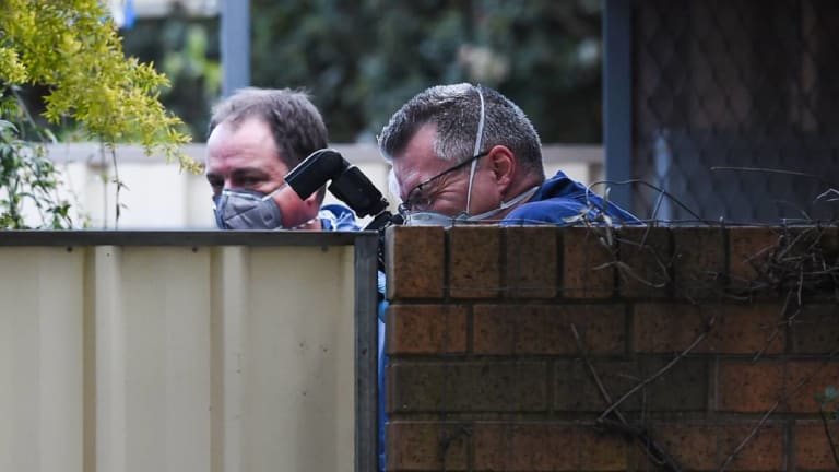 Police on the scene of a Wangaratta house where a body was found on Wednesday.
