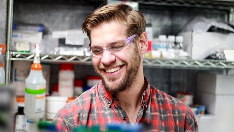 Zack Abbott working in the lab for ZBiotics.