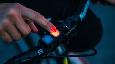 A wireless remote clips on to your handlebars.