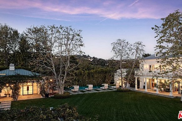 The home comes with landscaped grounds.