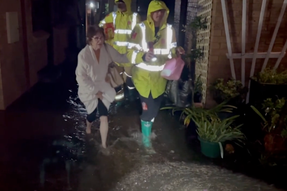 Footage supplied by Fire and Rescue NSW shows fire crews evacuating residents of an aged-care home.